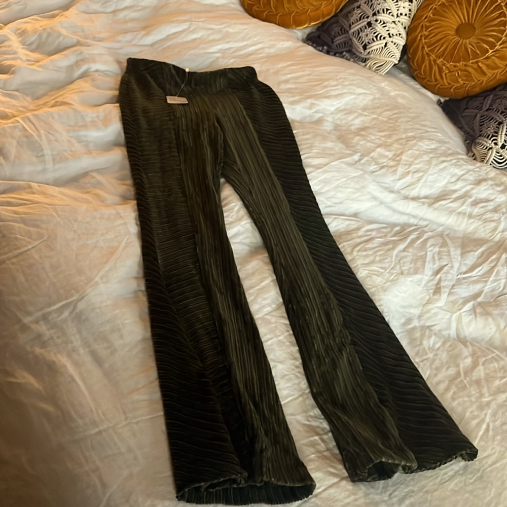Textured velvet flare pants. Olive green